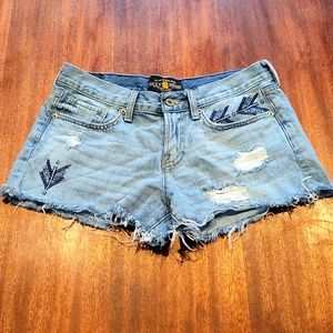 Women's Lucky Brand distressed jean shorts.   Size 4/27